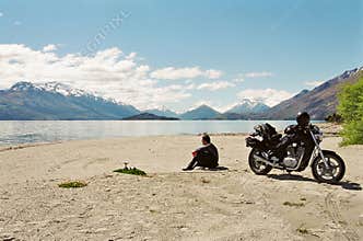 Motorcyce rider on lakeside