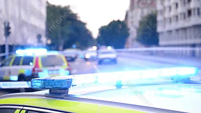 Police car flashing blue lights