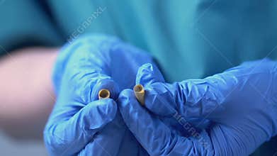Lab assistant showing counterfeit drugs, illicit trade of low-quality medicines