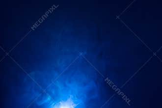 Blue color light beam , smoke texture spotlight . screening abstract background