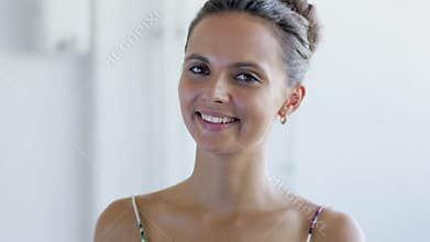 Friendly lady with elegant hairdo