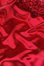 Red silk and roses
