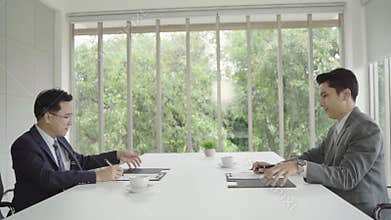 Slow motion - Handshake to seal a deal after a job recruitment meeting.