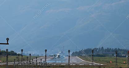 Airplane landing on airport Tivat in Montenegro