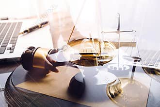 Business and lawyers discussing contract papers with brass scale on desk in office. Law, legal services, advice, justice and law