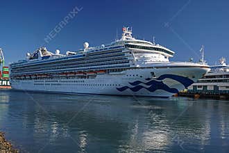 Cruise ship Grand Princess reverses from its berth at the Port of Los Angeles Cruise Terminal