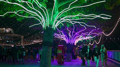 Shoppers enjoy the Southbank Christmas decorations at night