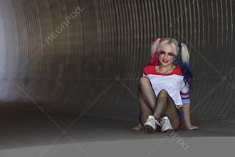 Cosplayer girl with in Harley Quinn costume