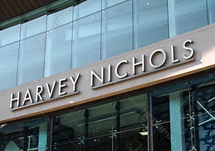 Sign above the harvey nichols department store in manchester city centre