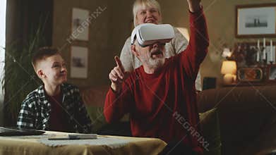 Grandfather in vitrual reality glasses