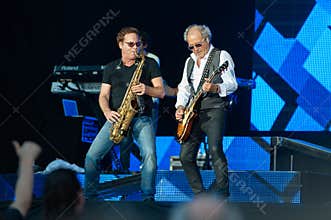 Live concert of the rock band Foreigner at the Arena Fiera Milano Rho, the guitarist Mick Jones and Thom Gimbel during the concert