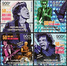 Four pictures of Rolling Stones in concert on stamps