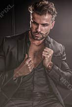 Handsome stylish sexy man in elegant suit