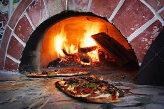 Pizza in a wood burning oven