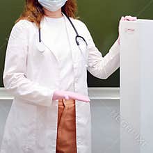 School nurse showing an ultraviolet lamp in a casing for air disinfection in a classroom - Moscow, Russia, September 07, 2020