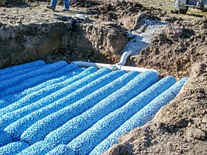 Packed bed septic leach field being installed