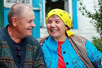 Cute smiles of an elderly couple