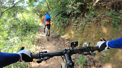 Cross country biking cyclists riding bike