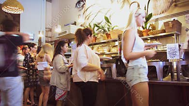 People queuing for plant based meal at Lentil As Anything