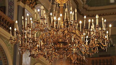 Old architectural church candle. Cathedral chandelier In the Church.
