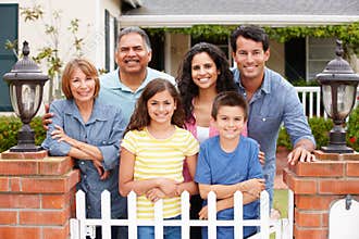 Hispanic family outside home