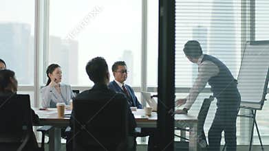 Group of asian business people meeting in office