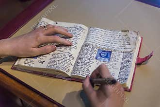 AMSTERDAM, NETHERLANDS - APRIL 25, 2017: Anne Frank diary in Madame Tussauds museum on April 25, 2017 in Amsterdam Netherlands