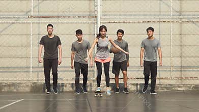 Young asian adults having fun with outdoor sport