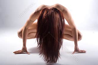 Nude woman with long hair