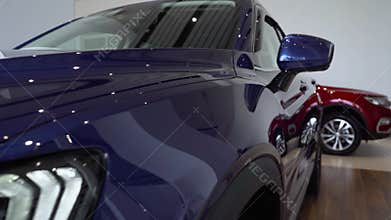 Close up of details of headlights and glass of anonymous prestigious luxury modern car. Concept of passion for driving