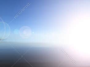 Bright blue sky abstract background with digital lens flare lighting.  Clear blue sky backgrounds with light of the sun