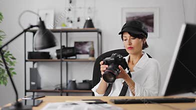 Photographer doing settings on camera