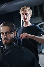 Hairstylist in barbershop
