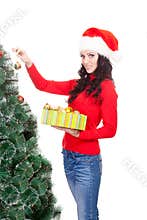 Woman decorating artifical fur tree