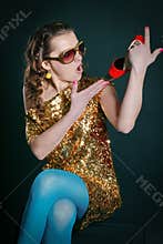 Crazy girl holding shoes