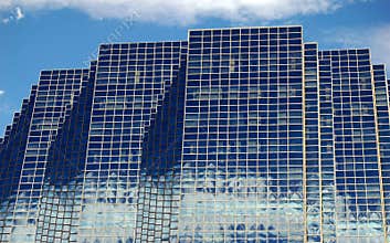 Glass Skyline with Cloud Reflections