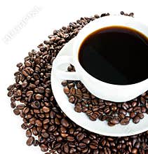 Coffee cup on beans
