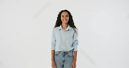 Young woman shaking head and saying yes
