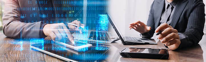 Business partnership coworkers using a tablet to chart company financial statements report and profits work progress and planning