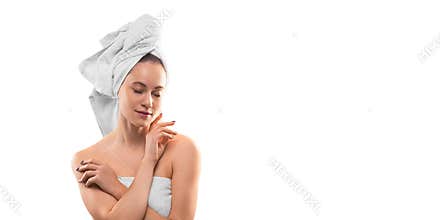 Portrait of a 40 years old woman with closed eyes and clean skin natural makeup isolated on white background. Photo