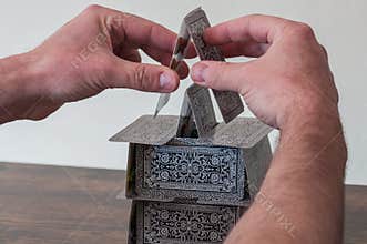 Building a house of cards