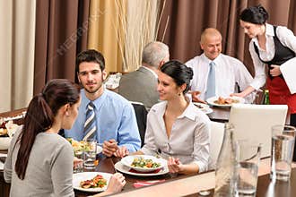 Business lunch restaurant people eating meal