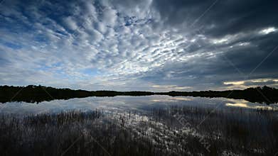 Timelapse of sunrise cloudscape over Everglades National Park, Florida 4K.