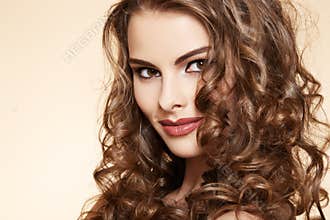Wellness. Beautiful model with long curly hair