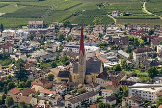 Superb aerial view of the old town of Silandro, South Tyrol, Italy, on a sunny day