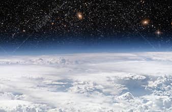 Storm clouds horizon from above and stars space background