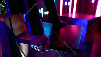 Burlesque dance show in strip club, closeup of hands and body of sexual stripper