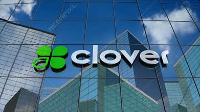 Editorial, Clover Network Inc. logo on glass building.