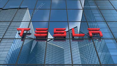 Editorial, Tesla logo on glass building.