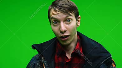 Young amazed surprised man face. Man opens his mouth and eyes in surprise, feels shock joy interest, received unexpected